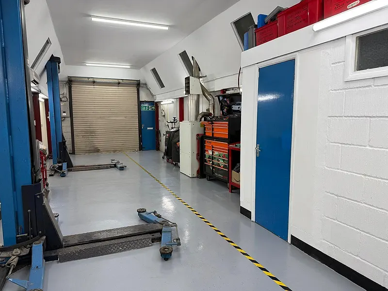 Vehicle lifts and tool storage in the Raimondi Auto Services workshop Old Woking